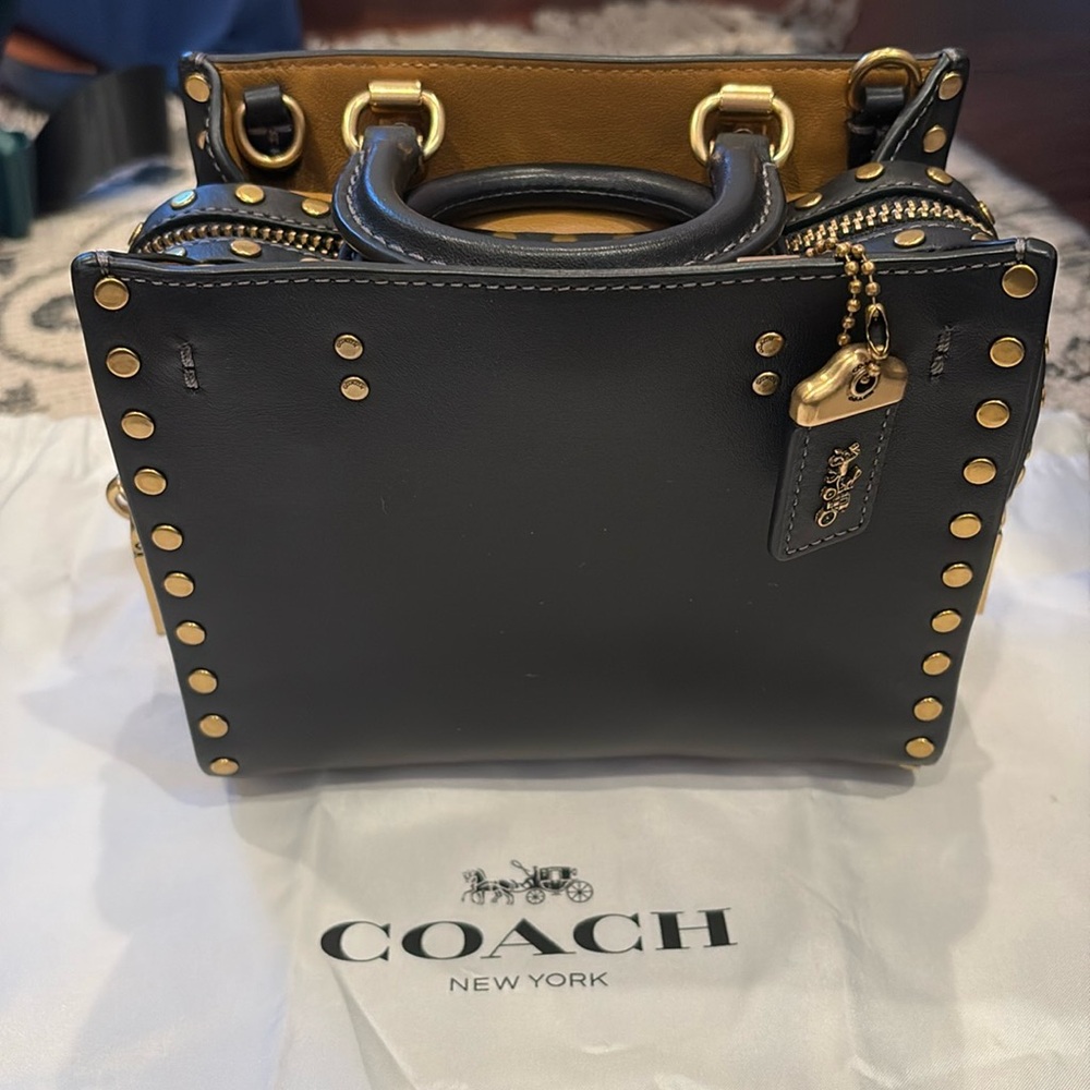Coach Rouge 17 with Rivets